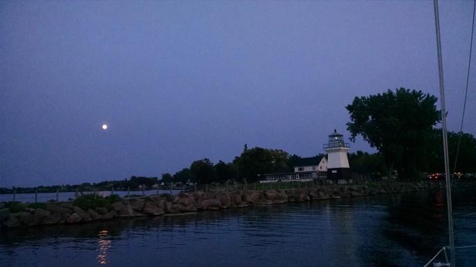Moonlit Cruise by the Oak Orchard Lighthouse by Lynne Menz Designs